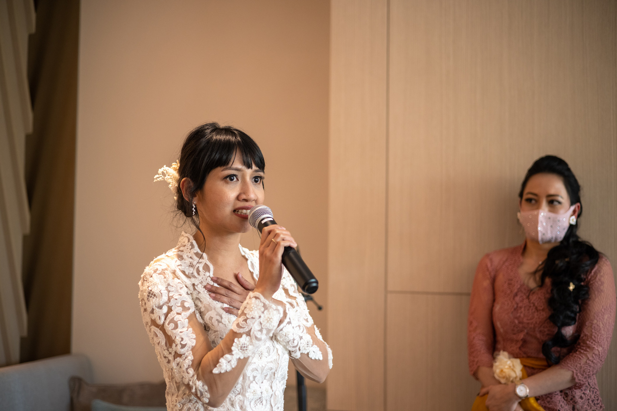 woman speaking at a wedding
