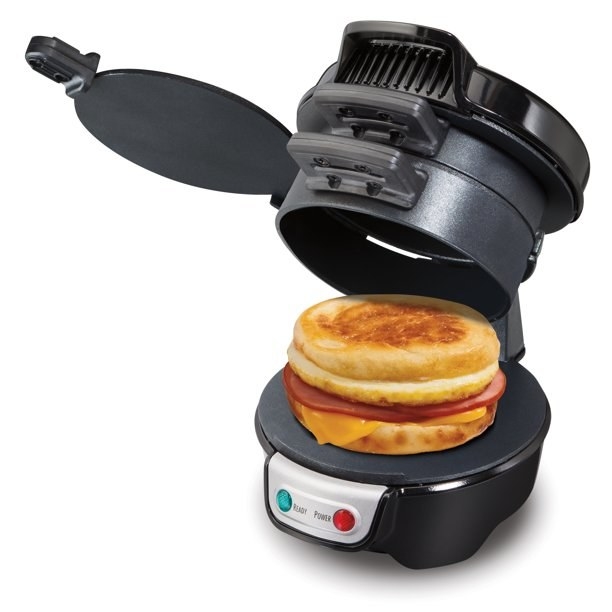 The breakfast sandwich maker with the breakfast sandwich on it