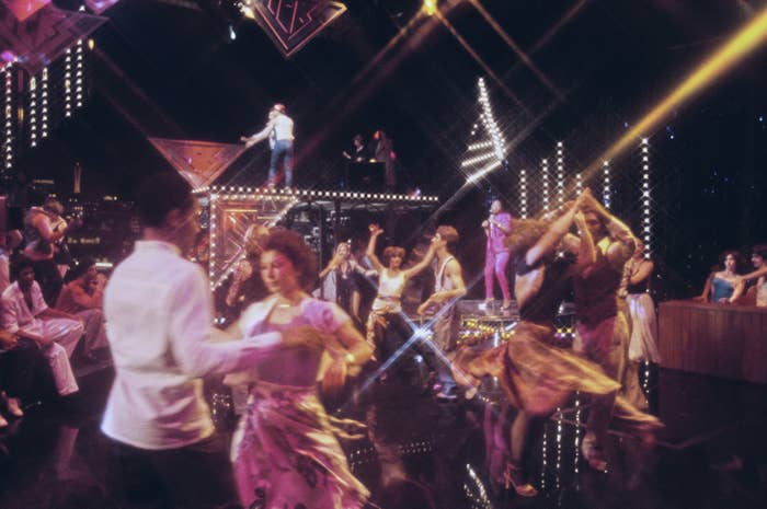 Clubbers on the dancefloor in an unspecified nightclub, location unspecified, circa 1975