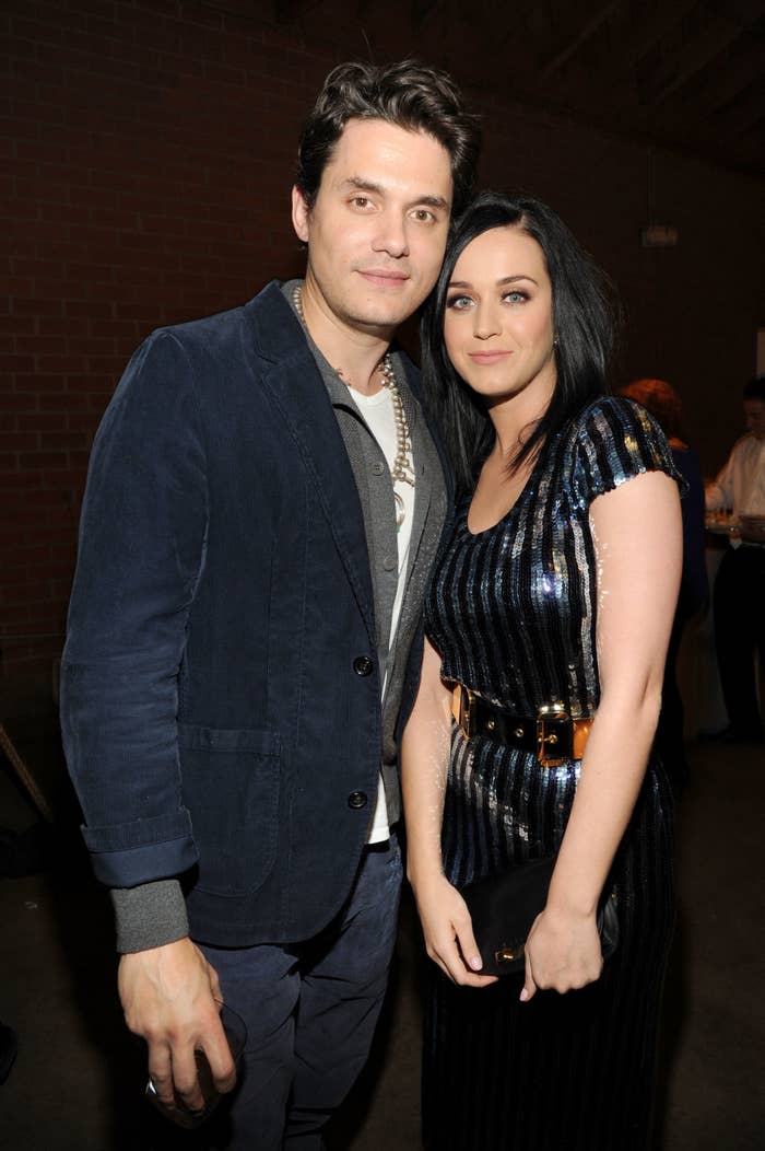 Katy and John posing during an event