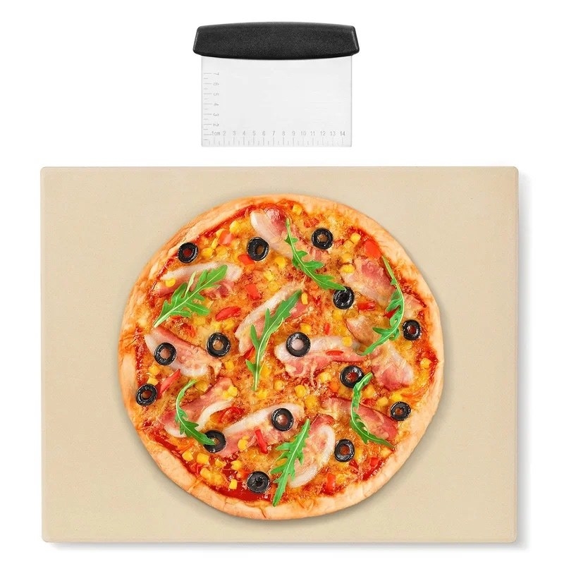 A tan pizza stone with a pizza with a pizza with colorful toppings