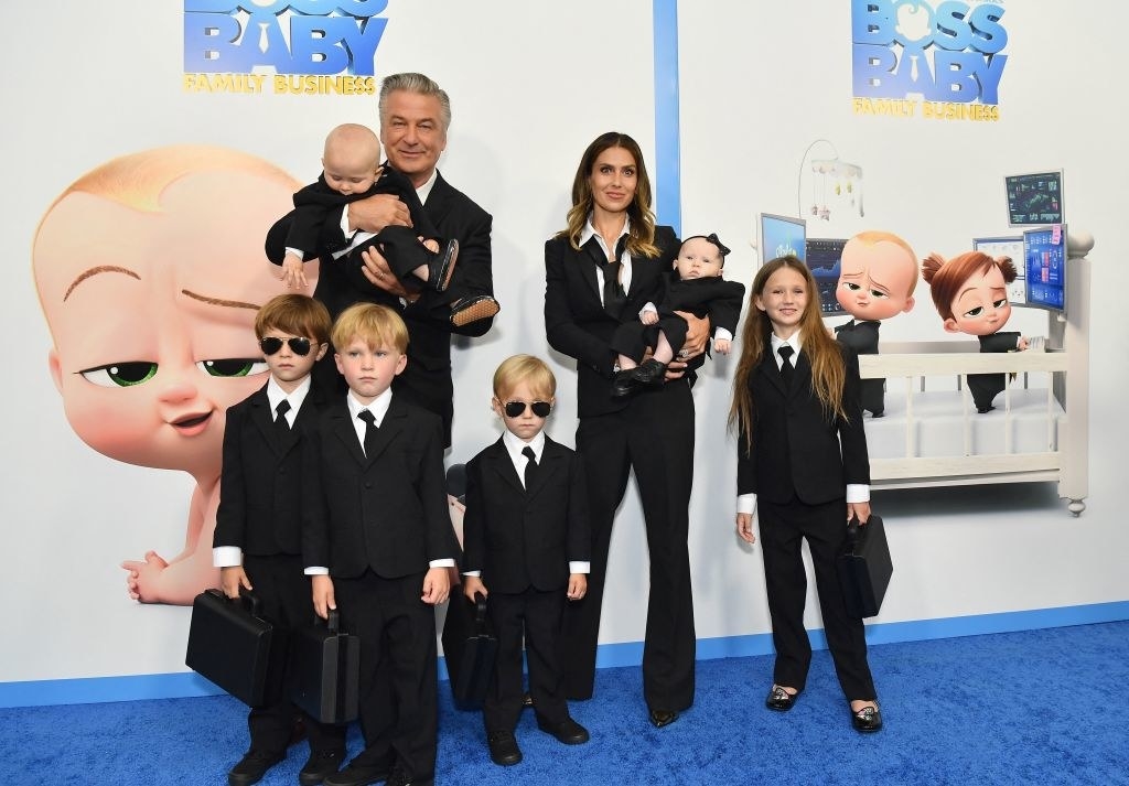 Hilaria and Alec posing with their kids for the Boss Baby premiere