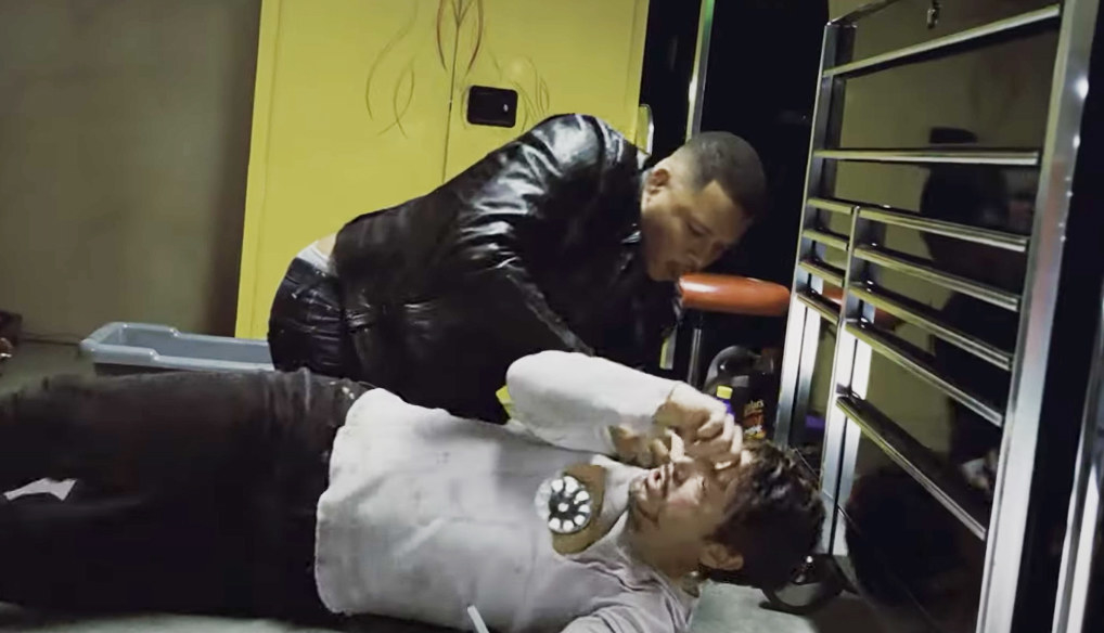 Terrence Howard and Tony Stark in a fight scene