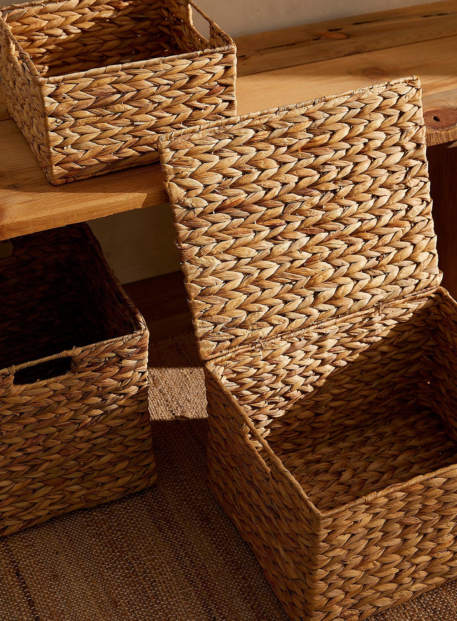 a lidded basket with the top flap open to show the inside