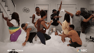 The &quot;Grand Crew&quot; cast dances at Wyatt&#x27;s after the washing machine has created a bubbly mess