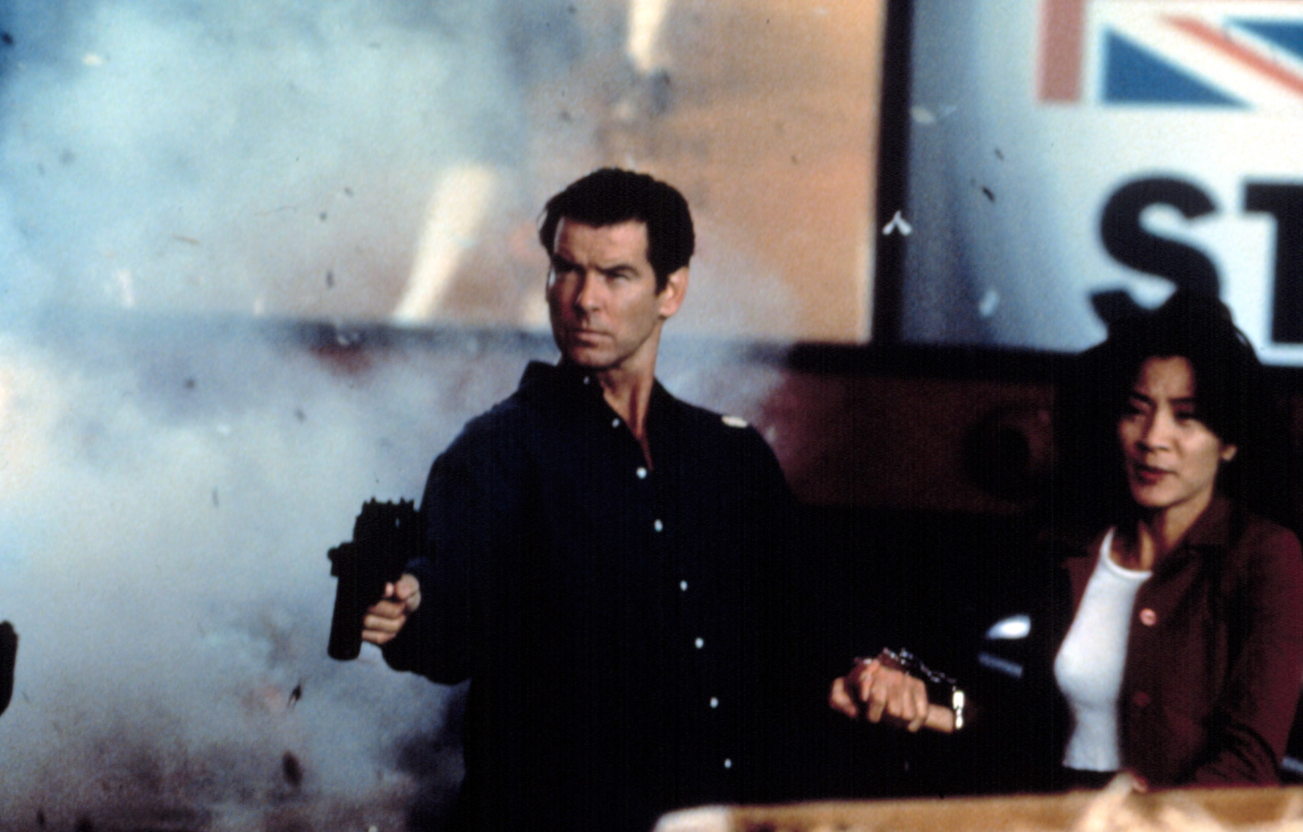 Pierce fires a gun with Michelle nearby in the film