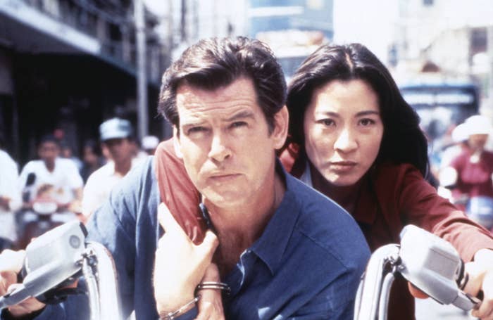 Michelle rides a motorcycle with Pierce Brosnan in the film