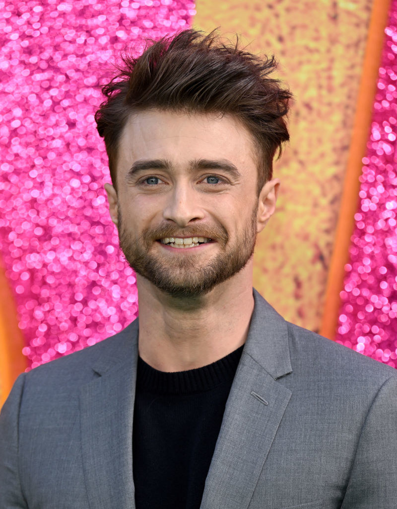 A closeup of Daniel Radcliffe smiling