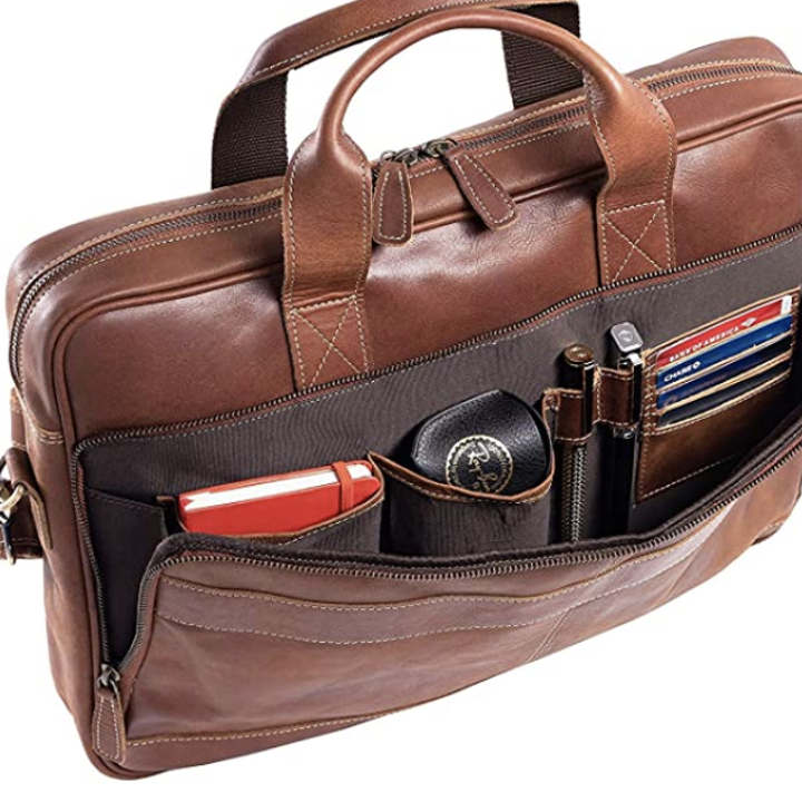 The messenger bag with the external pocket unzipped to show a notebook, glasses case, two pens, and four credit cards in their own dedicated pockets