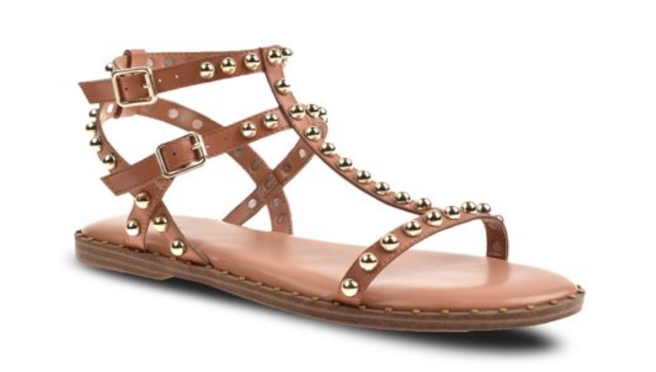 A brown/gold studded gladiator flat sandal