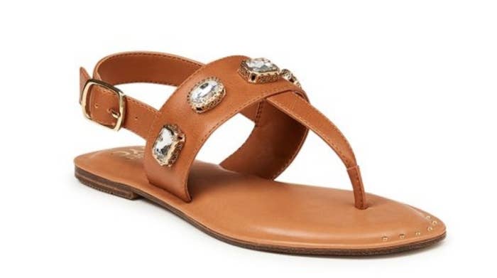 A brown jeweled thong sandal