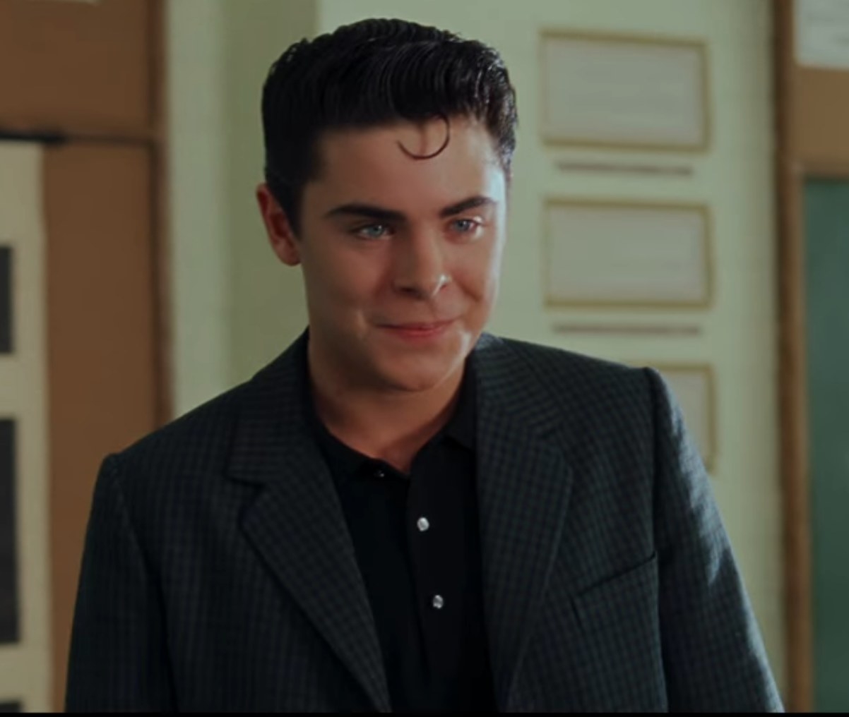 Zac Efron as Link Larkin smiles at Tracy Turnblad in &quot;Hairspray&quot;