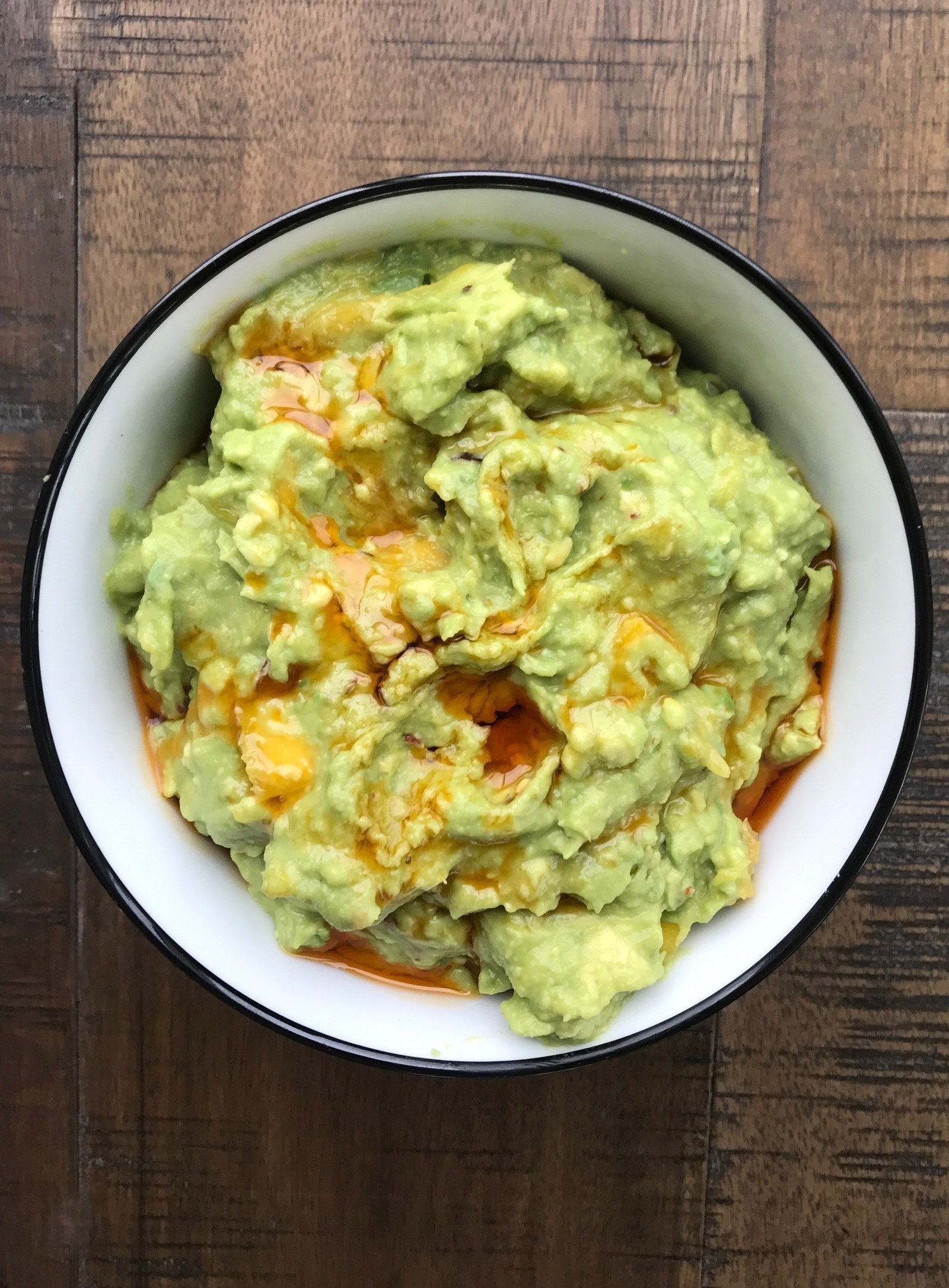 Guacamole topped with chili oil