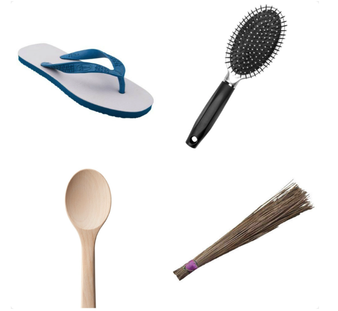 A slipper, hairbrush, wooden spoon and bamboo broom