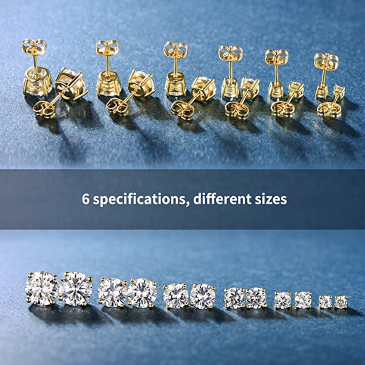 The earrings, front and back, lined up to show their different sizes
