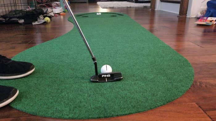 reviewer photo showing the putting mat in their home