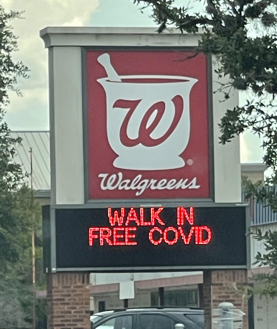 walgreens sign reading walk in free covid