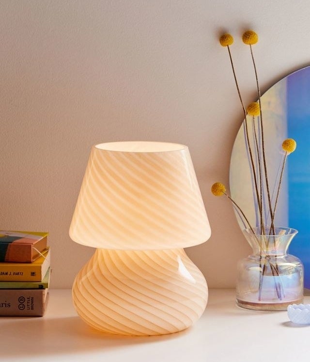 the glass lamp on a table