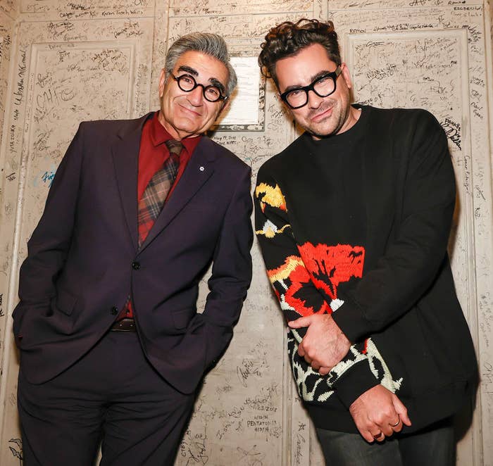 Dan and Eugene Levy pose for a photo together