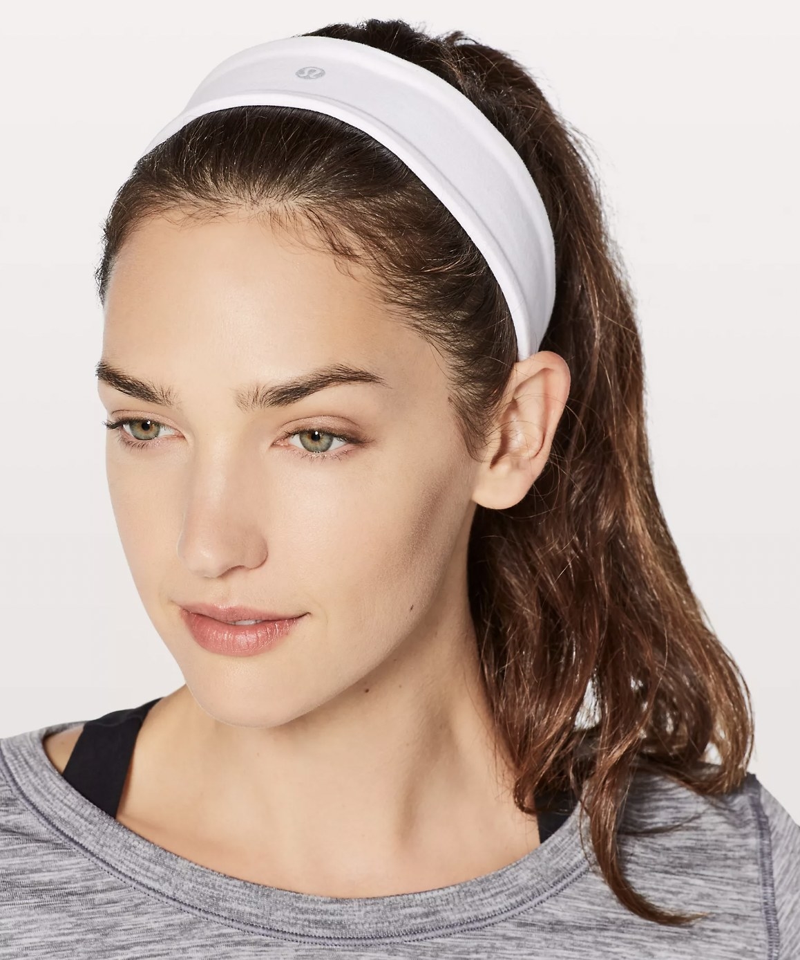 Model wearing the white headband