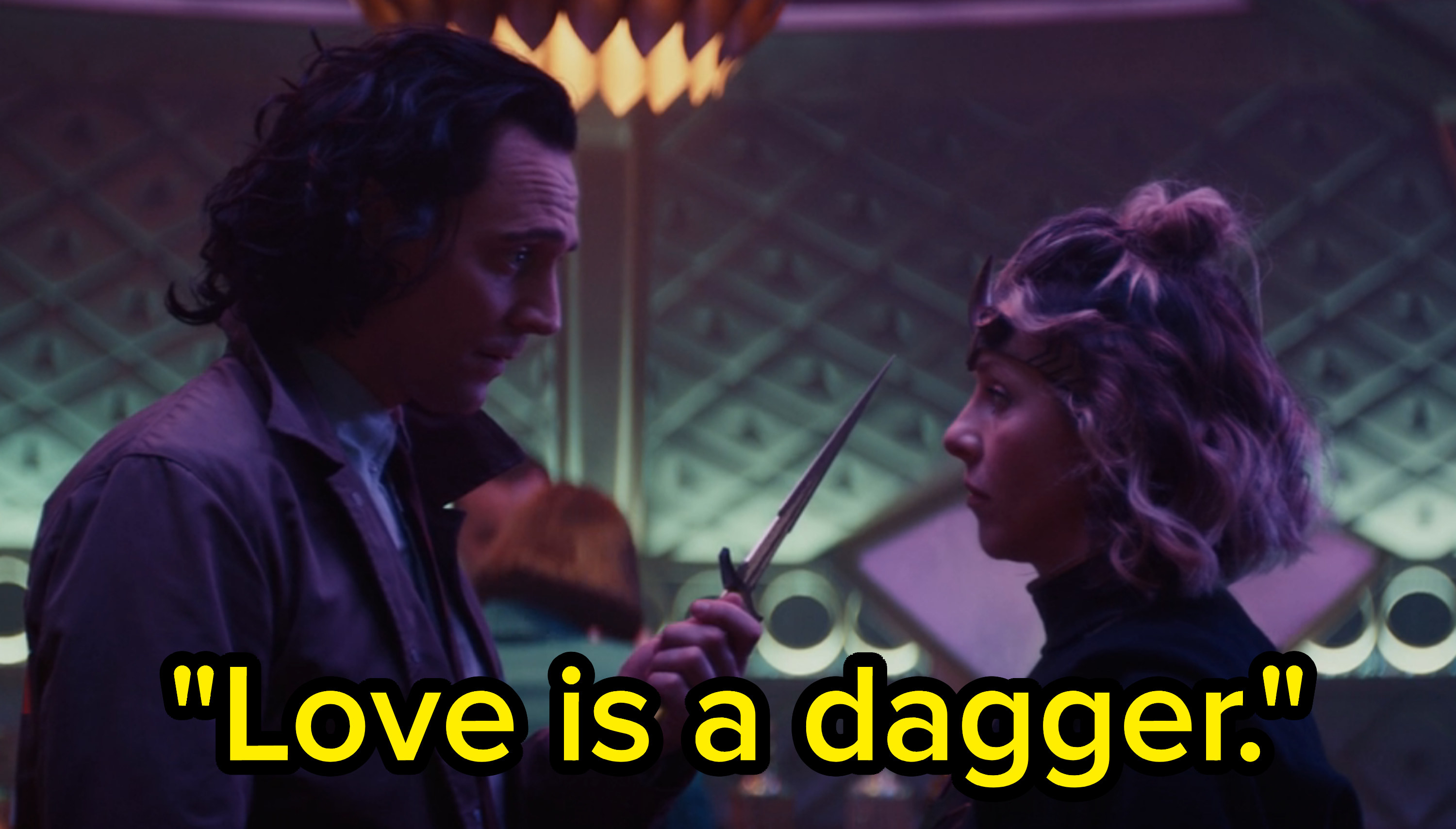 Loki holds out a dagger towards Sylvie