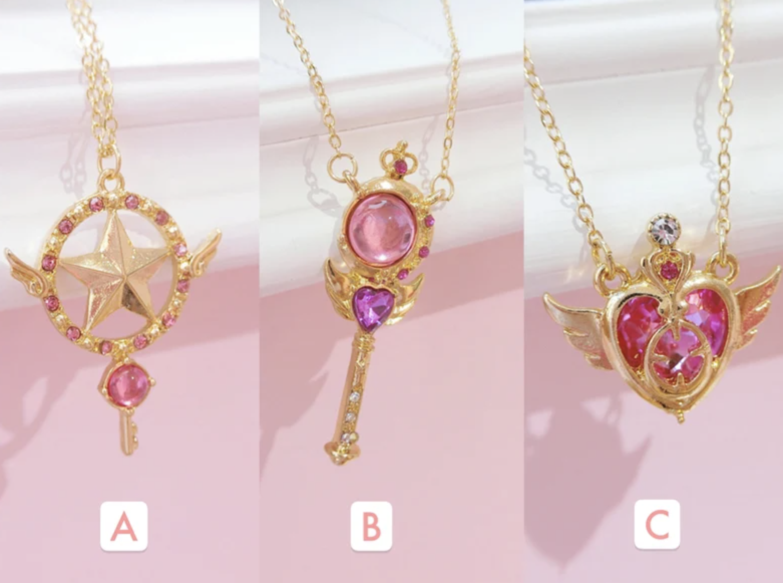 Left to Right: Cardcaptor Sakura Star Key Wand necklace; Sailor Moon Wand; Sailor Moon Heart
