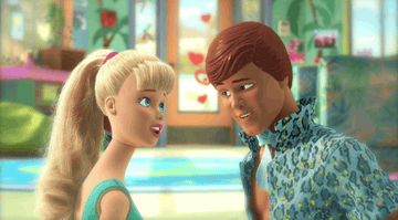 Animated Barbie giggling as Ken smiles