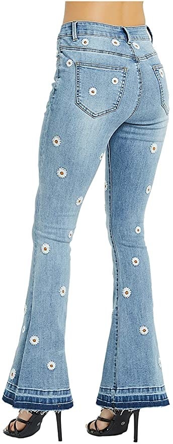 a model wearing the jeans and showing them from the back