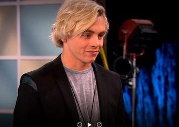 Austin Moon is giving a charismatic smile