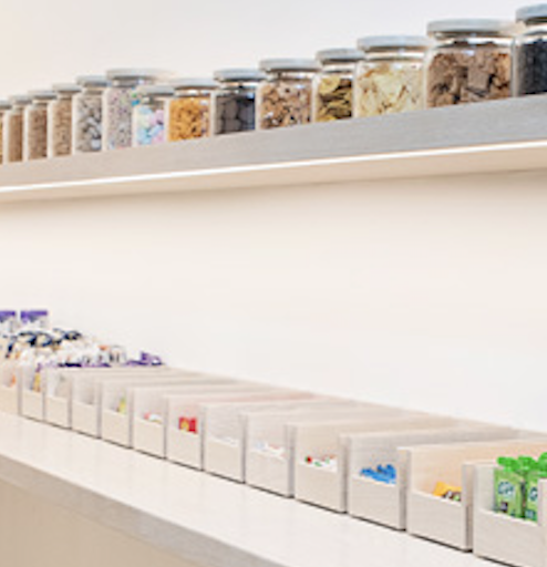Zooming in on the open-faced bins, which all hold different varieties of snacks
