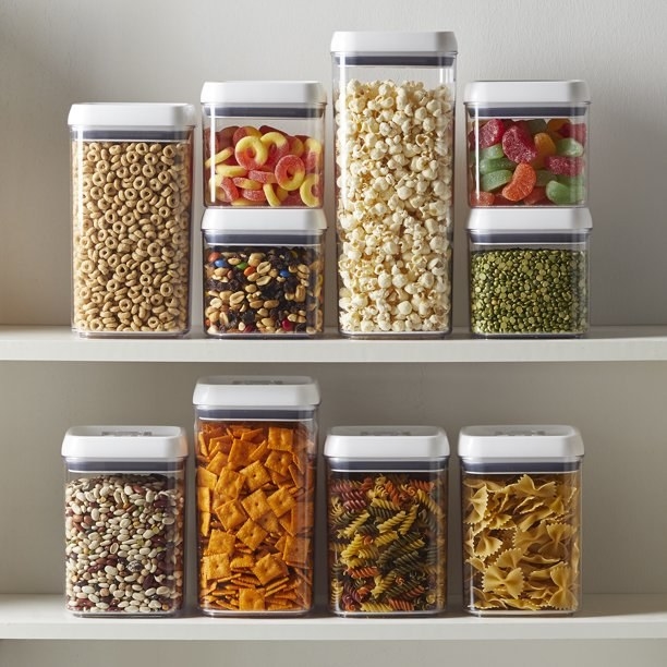 the storage containers in different sizes with ingredients in them
