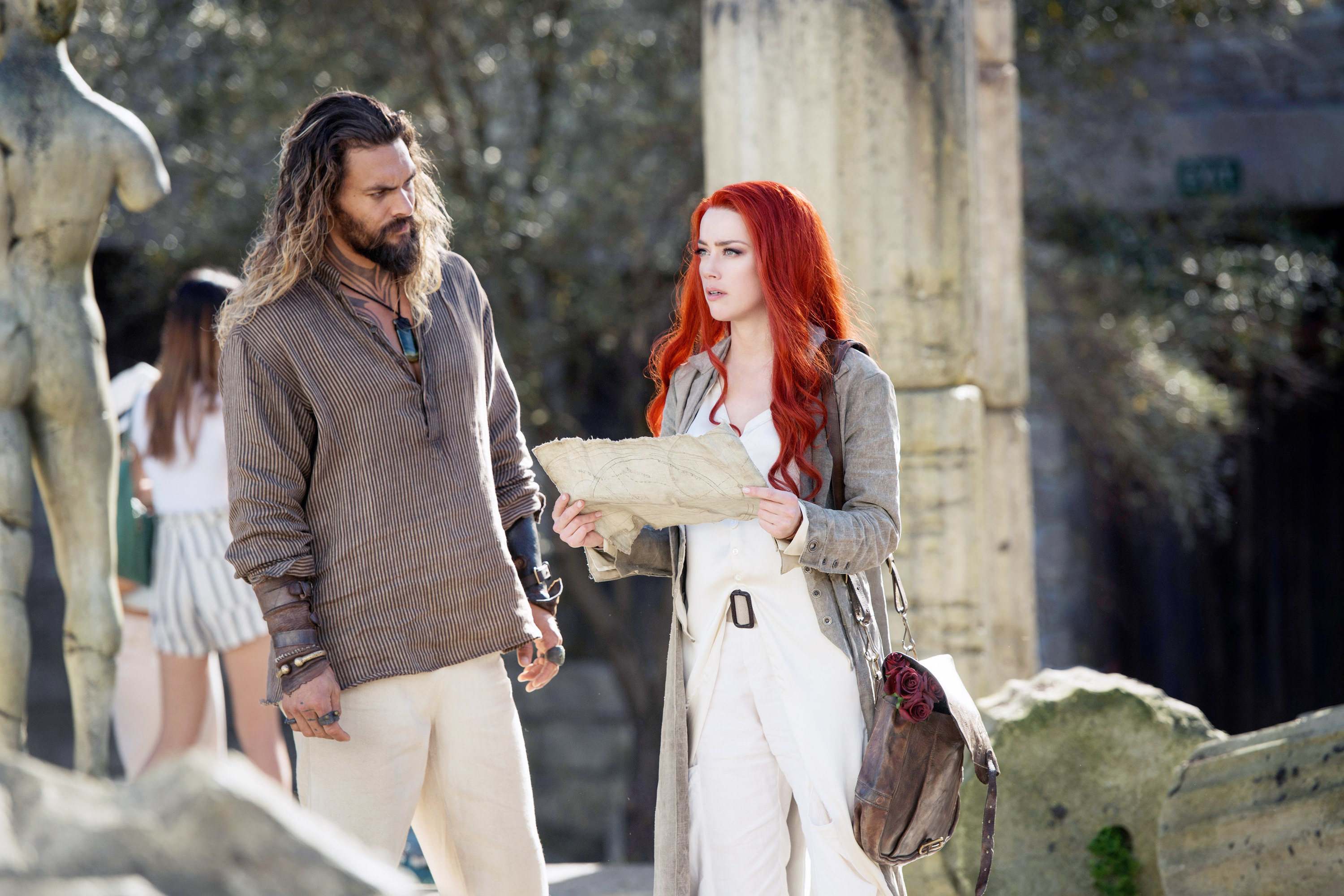 Jason Momoa and Amber Heard standing together