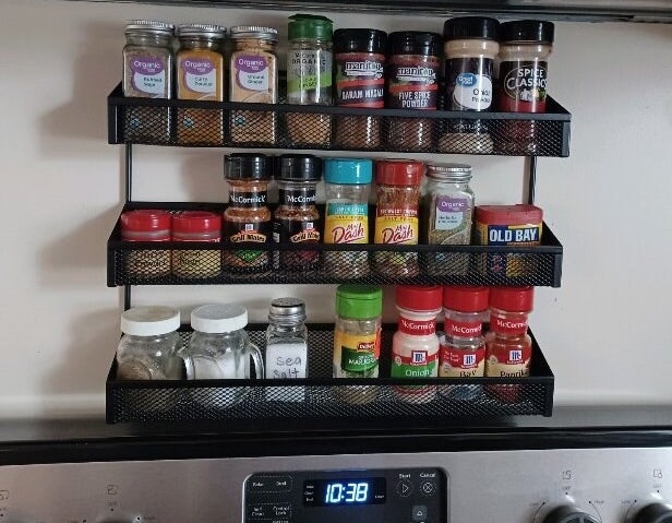 the spice rack over an oven range