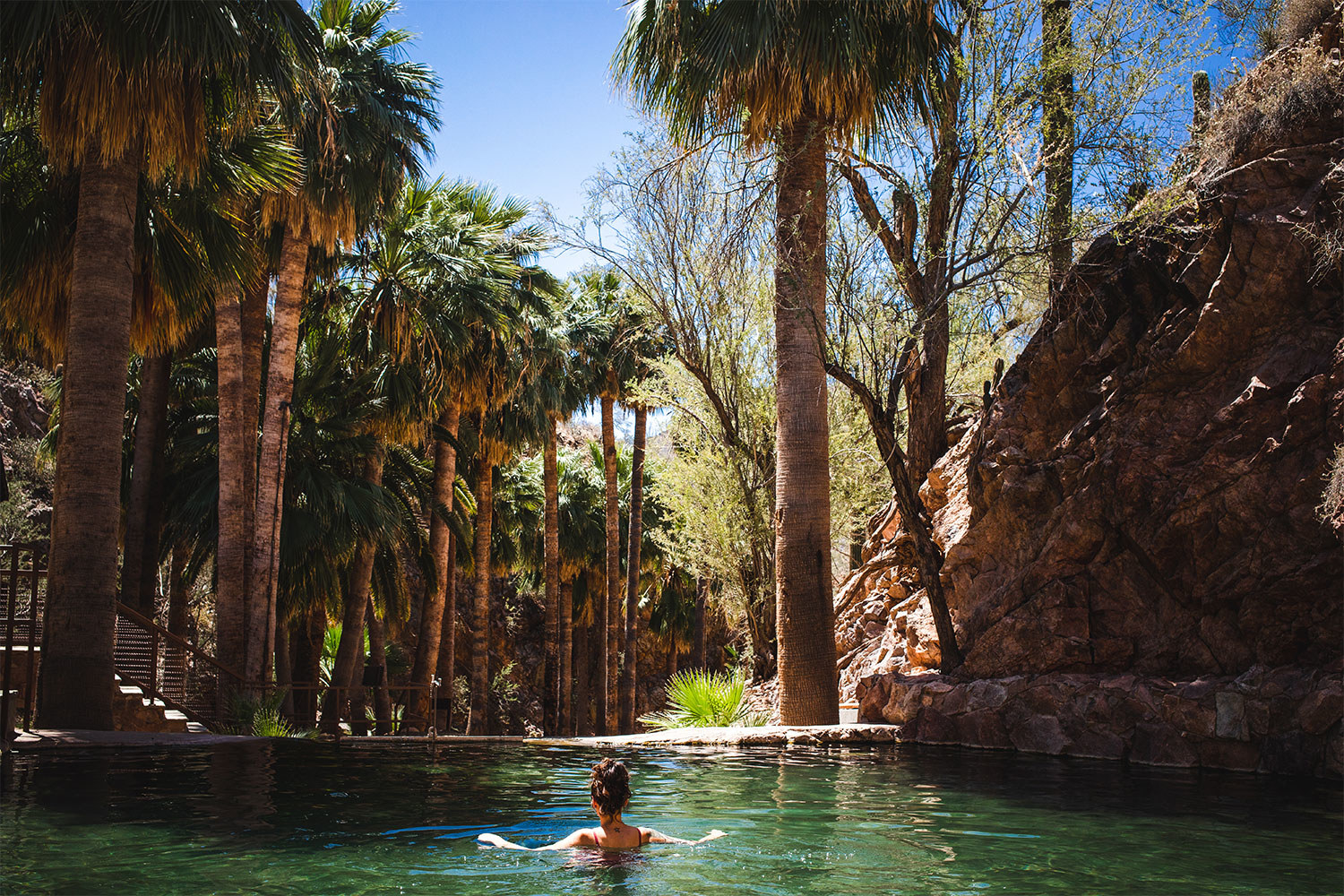 A woman bathing in a hot spring.