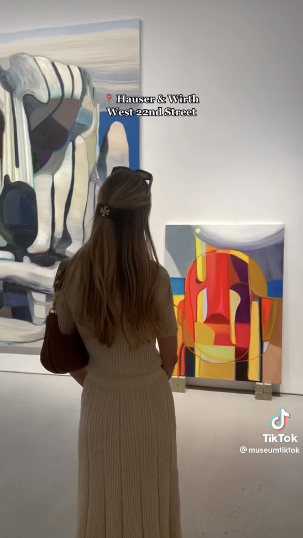 Woman looking at artwork