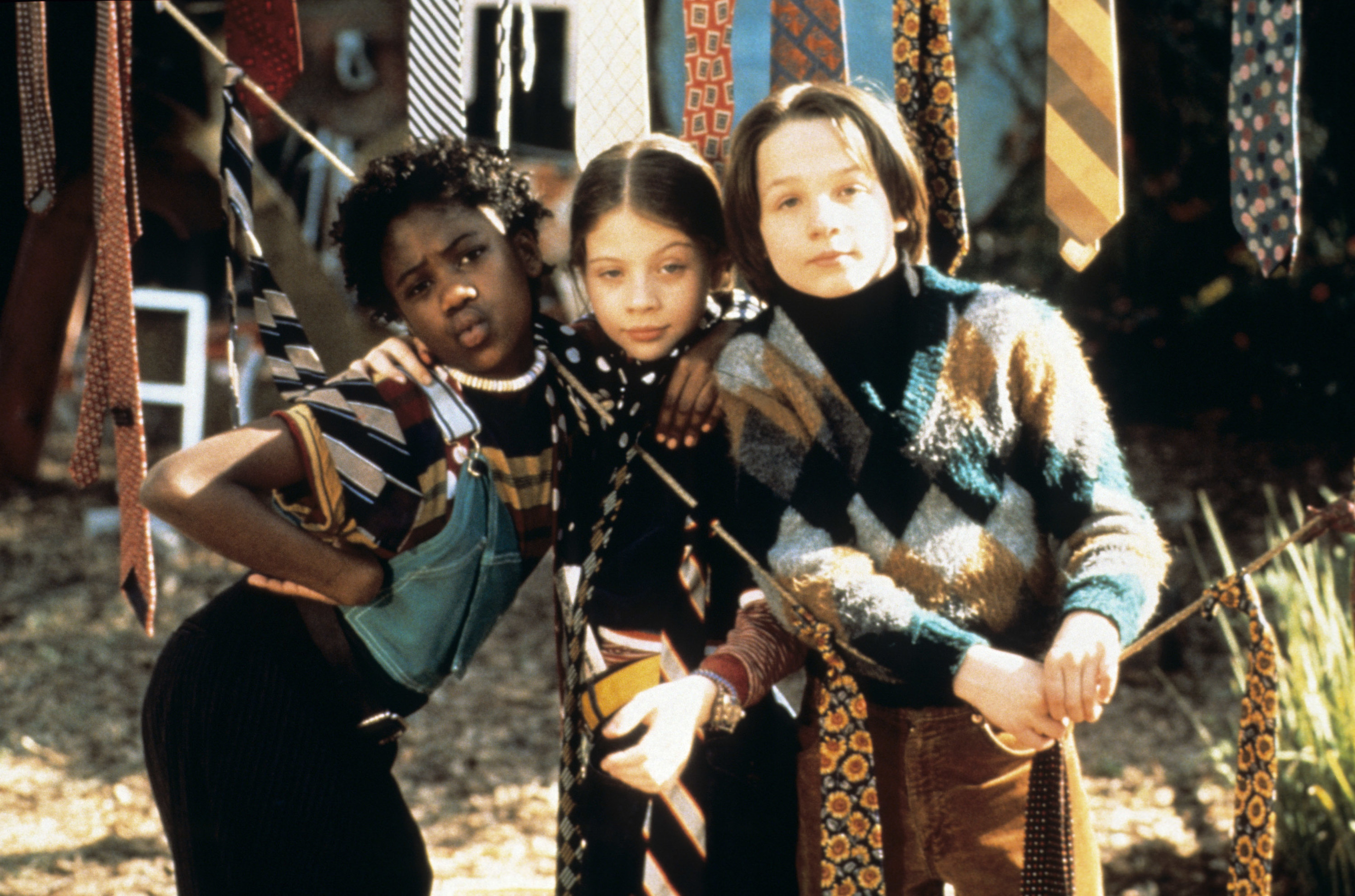Vanessa Lee Chester, Michelle Trachtenberg, and Gregory Smith as Janie, Harriet, and Sport in &quot;Harriet the Spy.&quot;