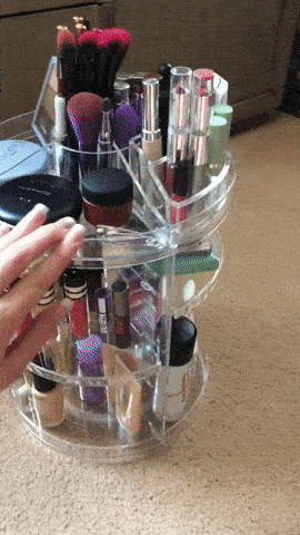 gif of someone spinning the makeup organizer to give a 360 view