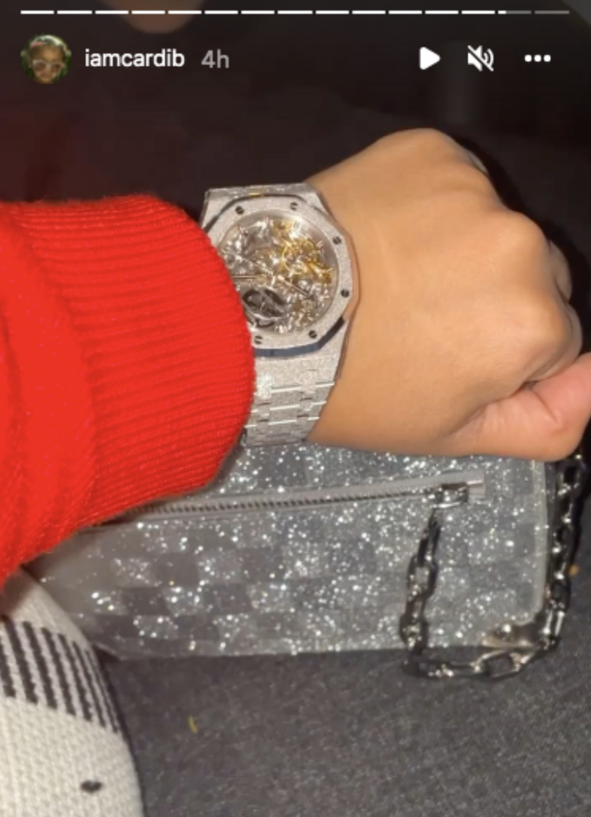 Cardi showing off her watch on her Instagram story