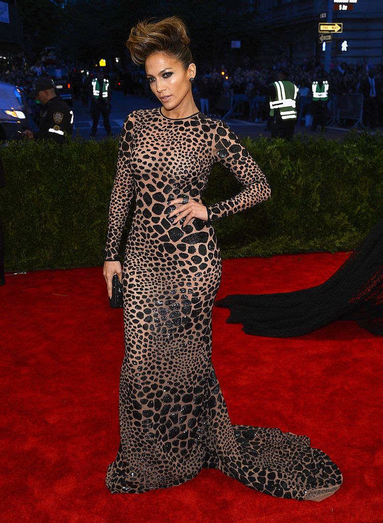 Jennifer wearing what looks like a leopard print dress if all the prints were black