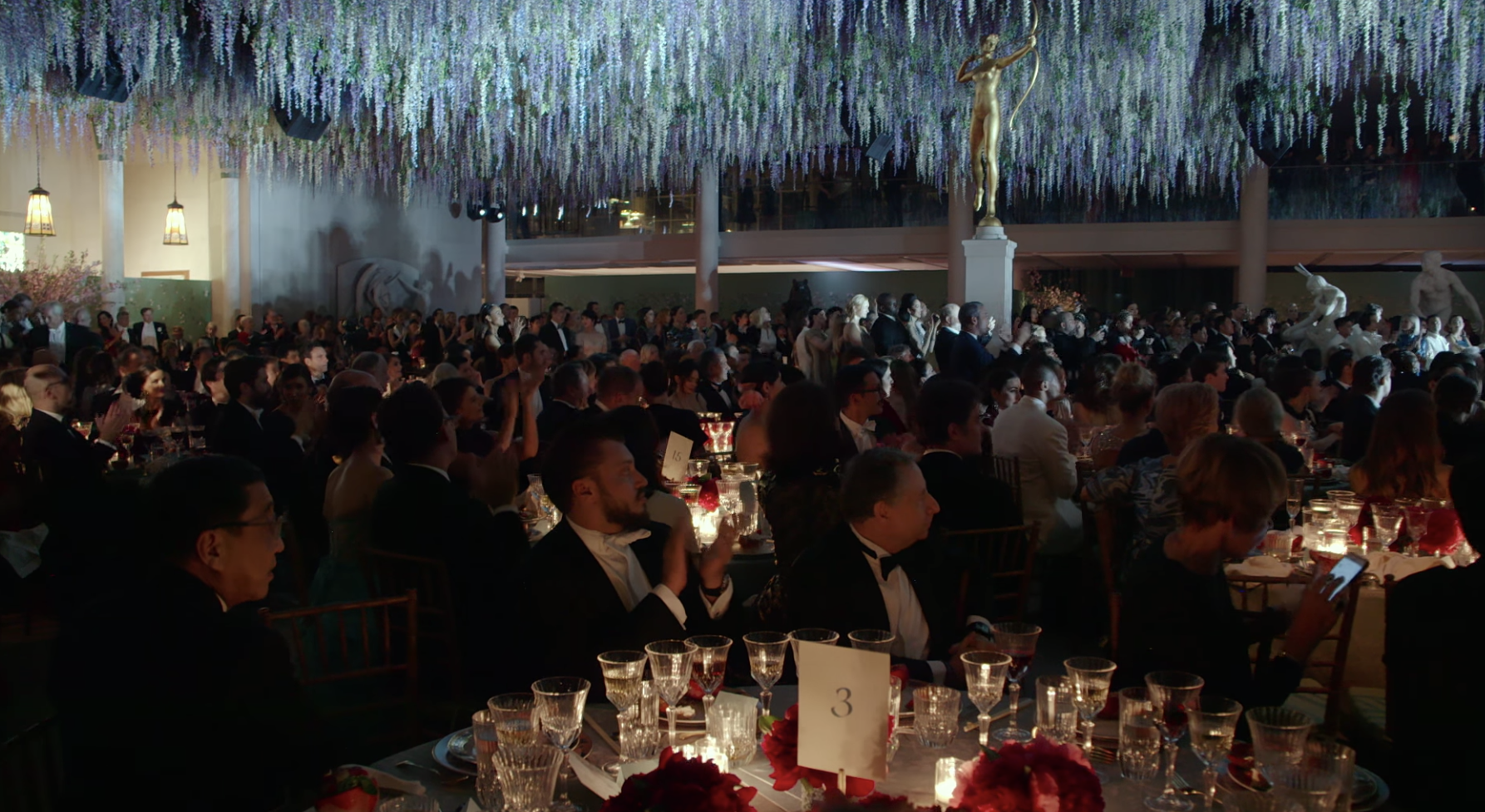 Guests seated at their dinner tables inside the Met Gala