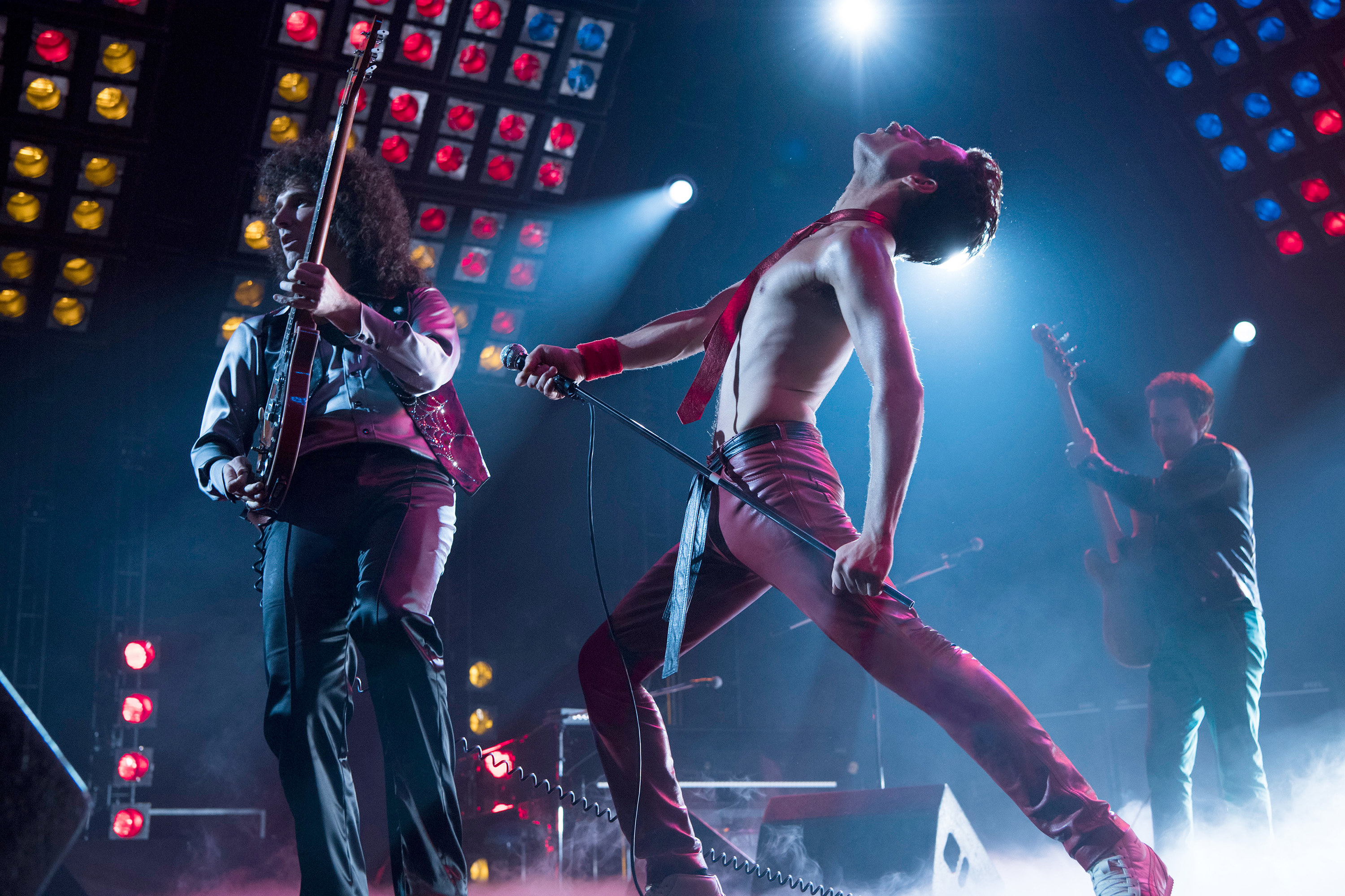 Freddie Mercury singing on stage
