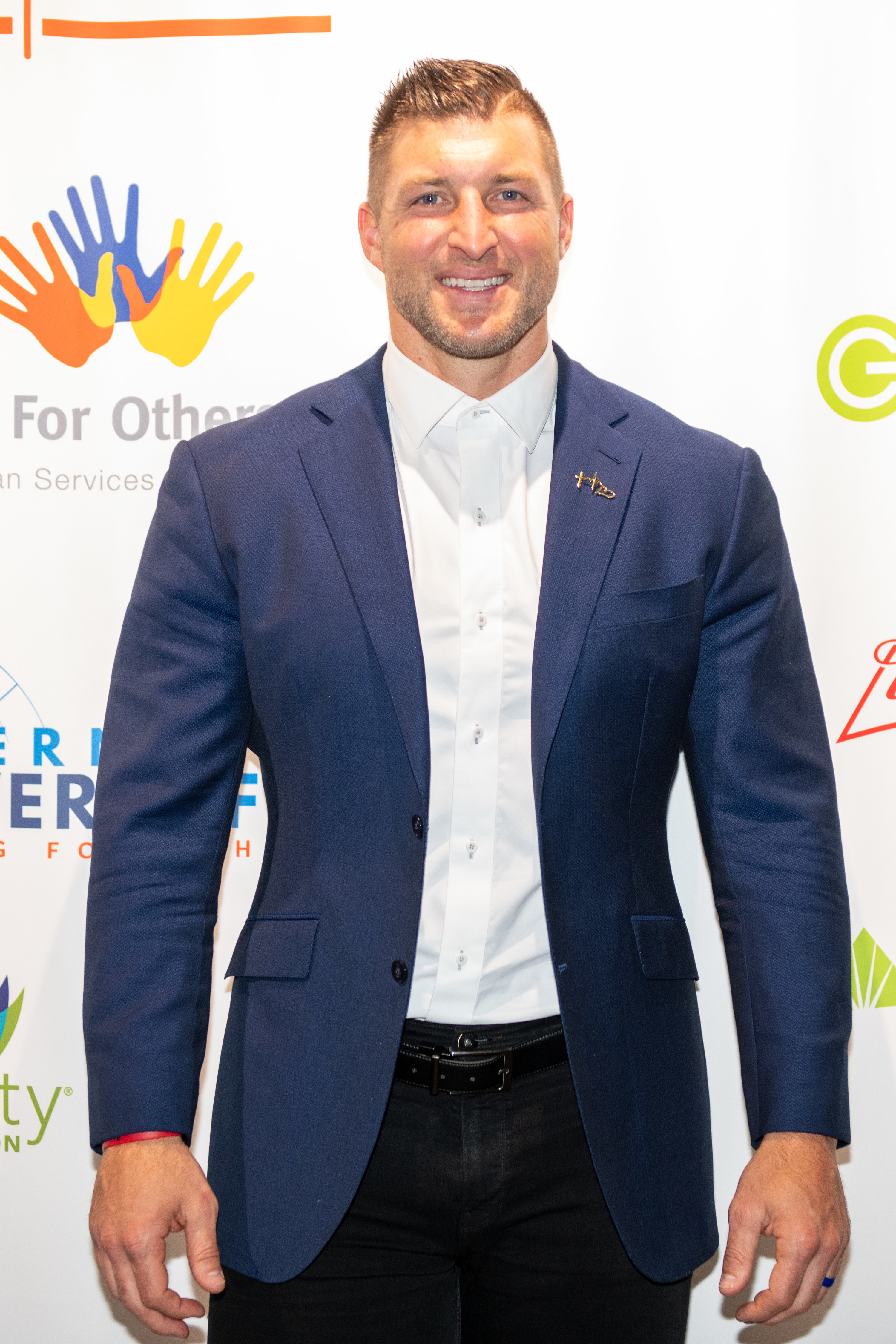 Tim Tebow is photographed at the International Poverty Forum on March 04, 2022