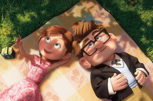 carl and ellie from up laying on a picnic blanket
