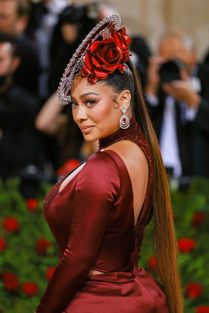 A closeup of La La Anthony from the waist up