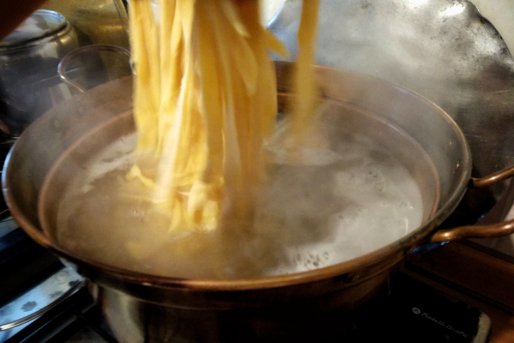 Close-up photo of pasta being boiled