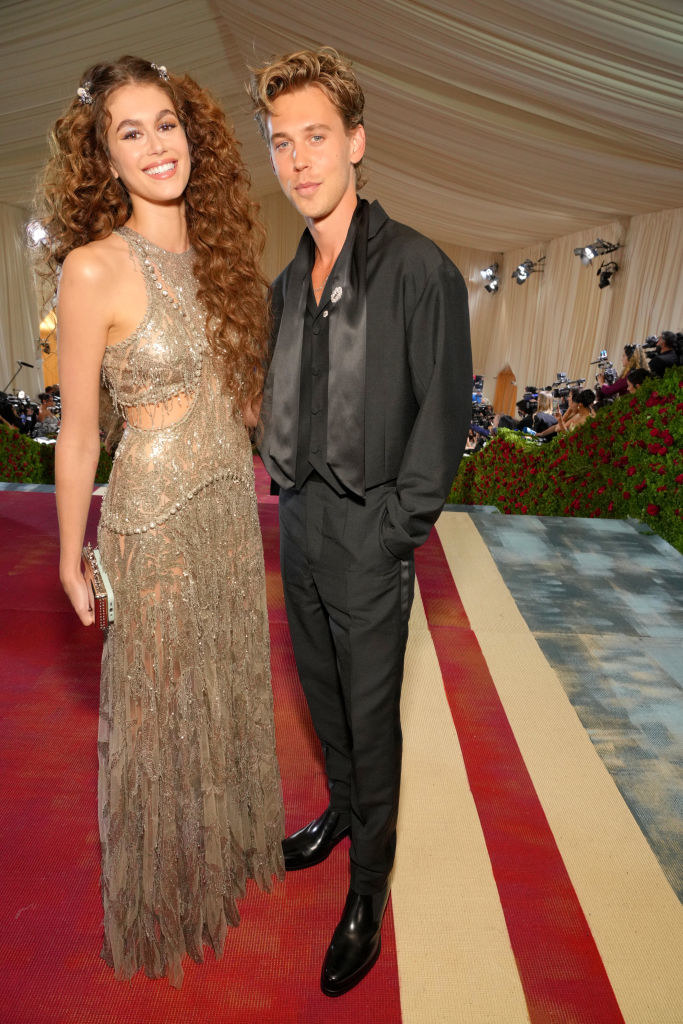 Kaia Gerber standing on the red carpet with Austin Butler