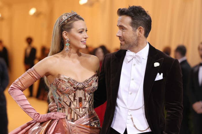 Blake Lively and Ryan Reynolds looking at each other