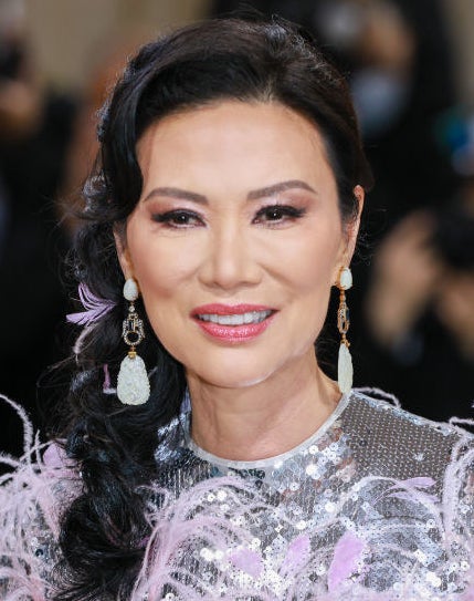 Closeup of Wendi Murdoch&#x27;s face and earrings