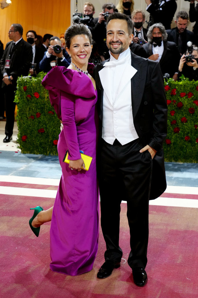 Vanessa Nadal in a slit gown and Lin-Manuel Miranda in a long-jacketed tux