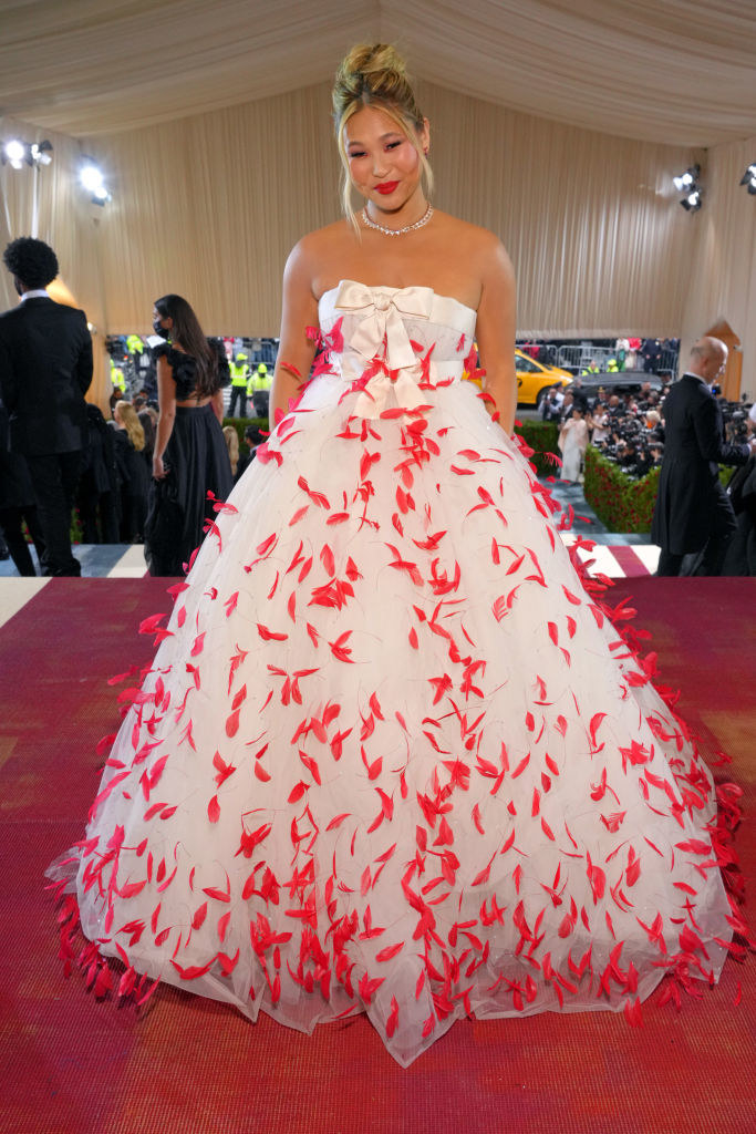 Chloe Kim in a ballgown adorned in feathers